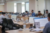 Perwakilan eksekutif membacakan materi paparan.